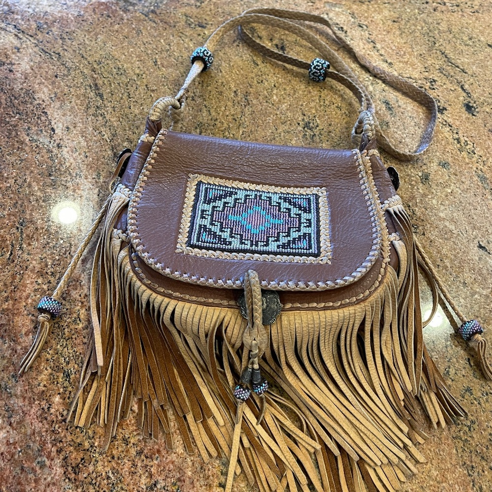 Handmade Hand Beaded Buffalo Leather Fringe Bag by Skip Hepburn.